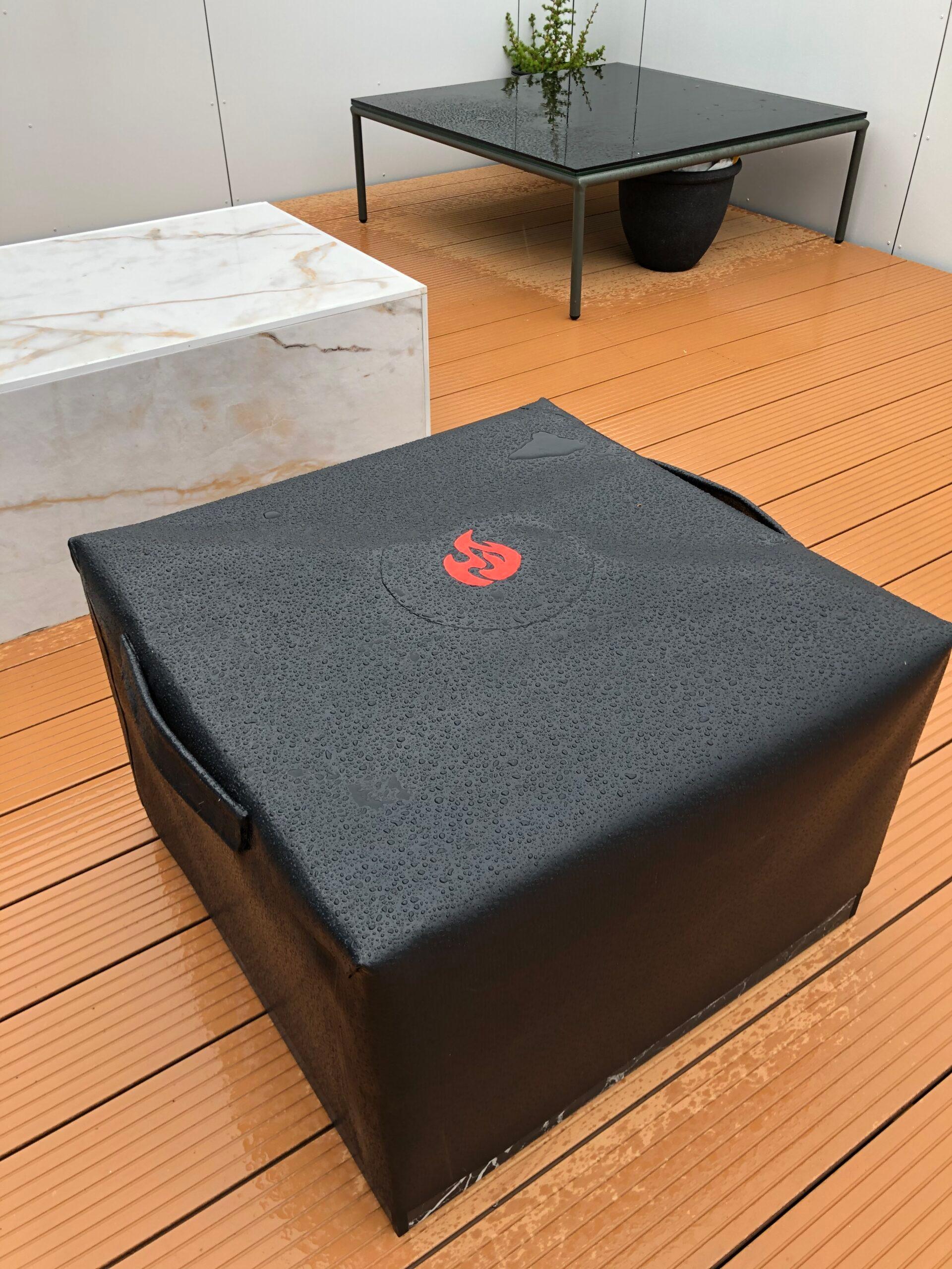 A cover over an outdoor fire table